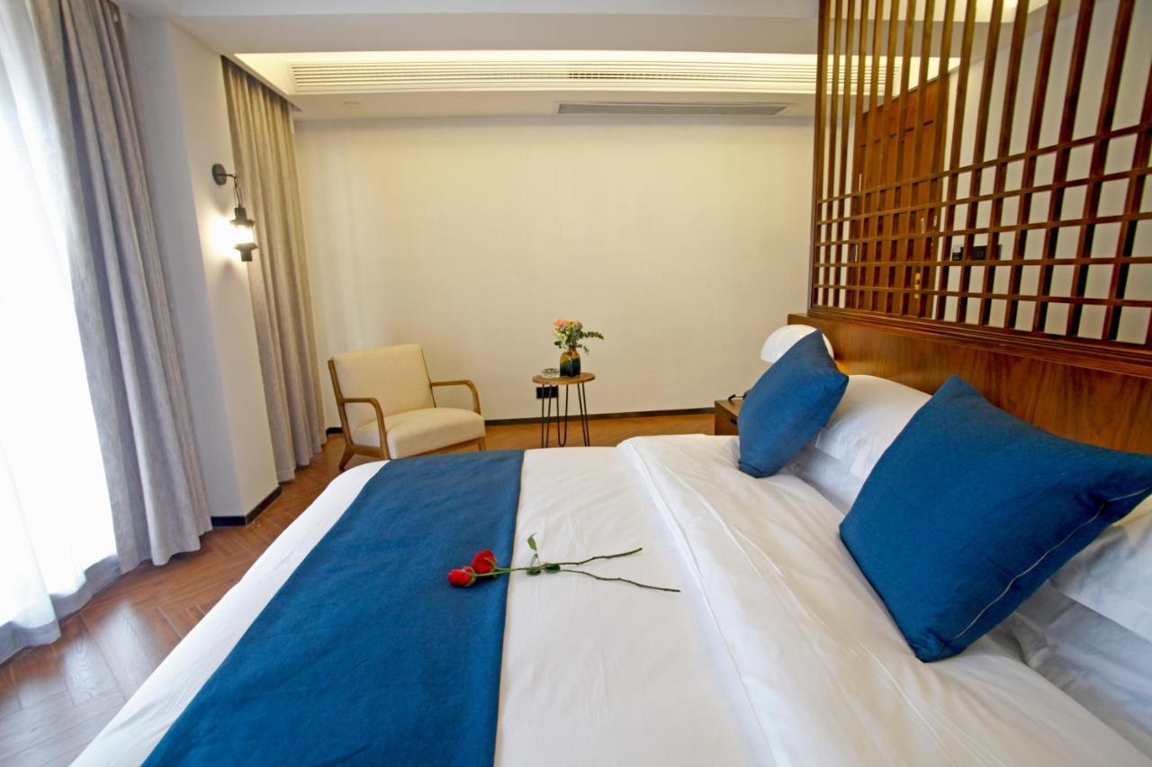 張家界武陵源北岸輕奢客棧 森林公園店 Hotel Zhangjiajie Eksteriør billede