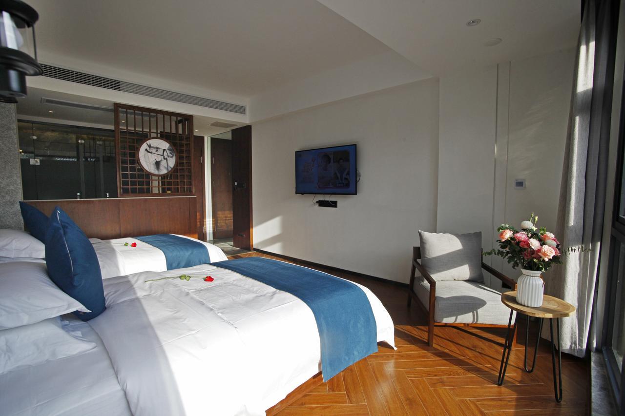 張家界武陵源北岸輕奢客棧 森林公園店 Hotel Zhangjiajie Eksteriør billede